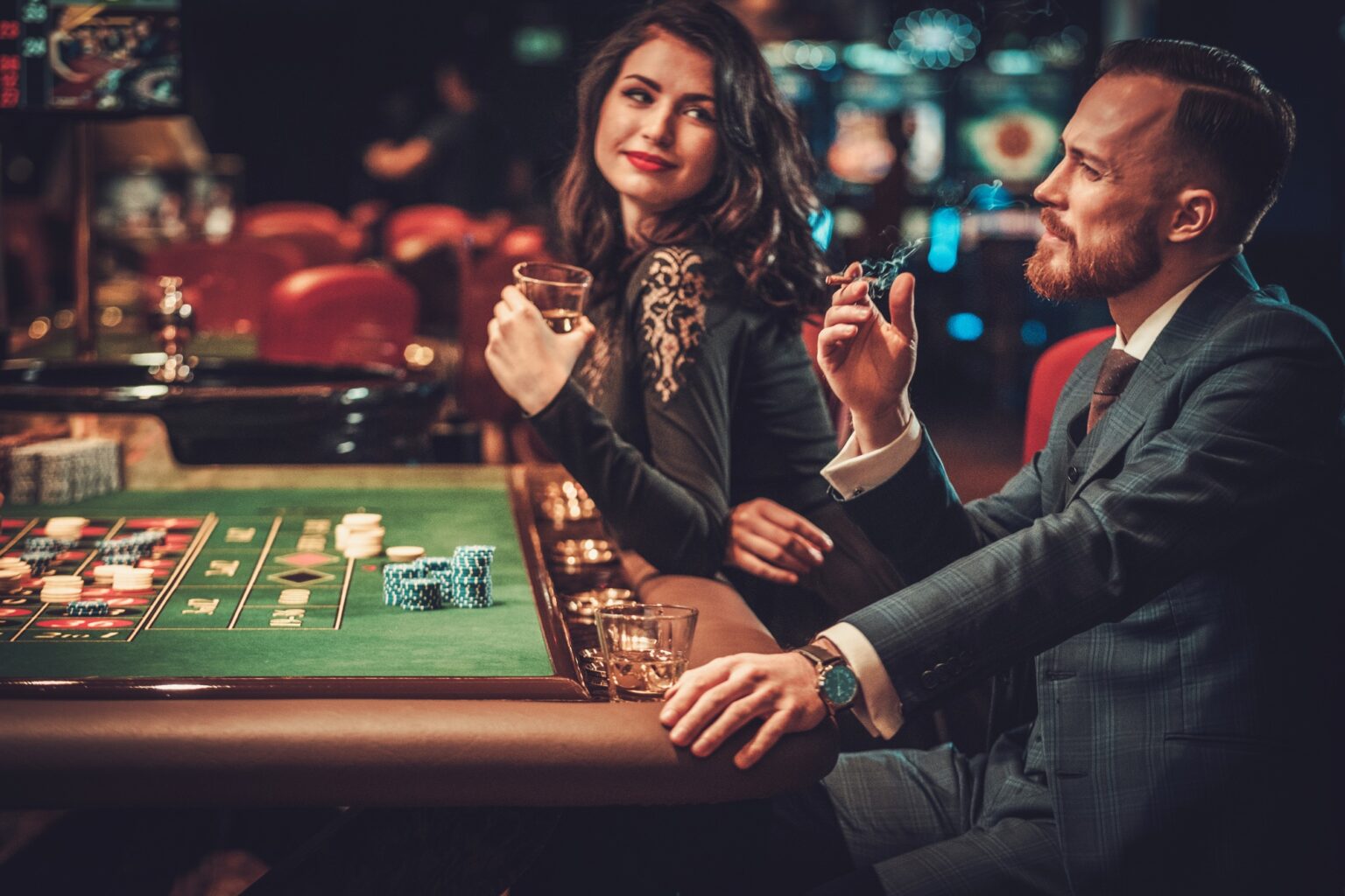 Upper class couple gambling in a casino